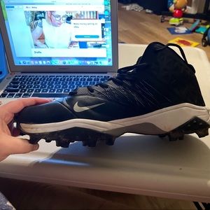 Mens Size 14.5 Nike Cleats Sliver and Black. In great Condition.